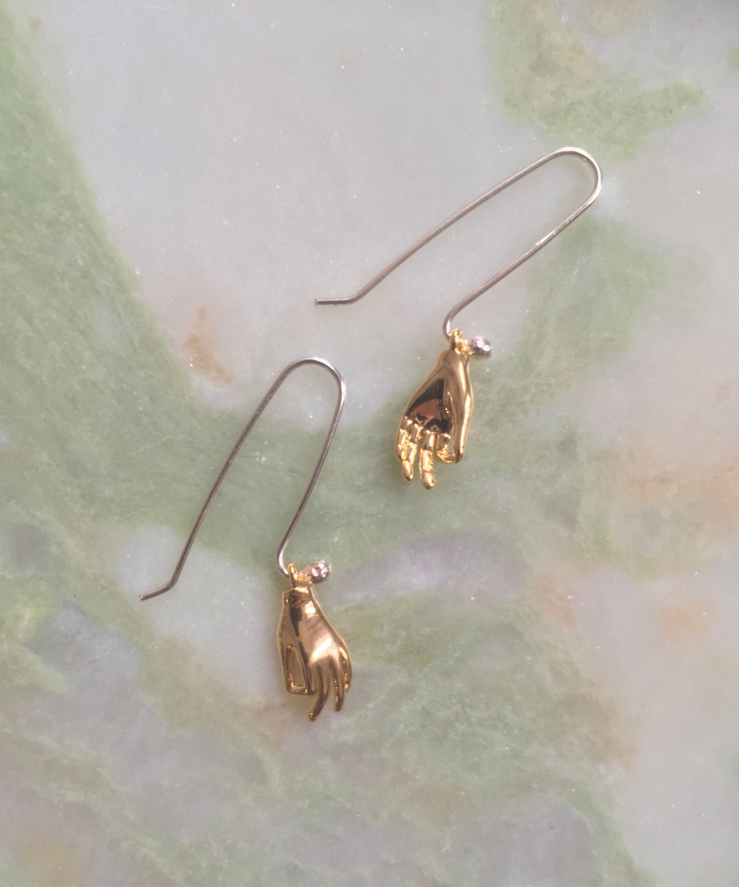 Helping hand earrings