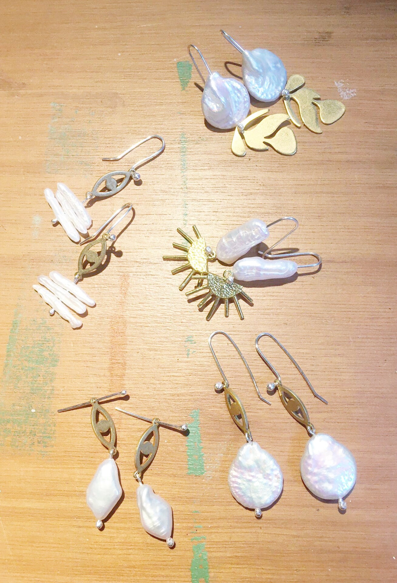 Brass leaf earrings, with pearl and silver hooks