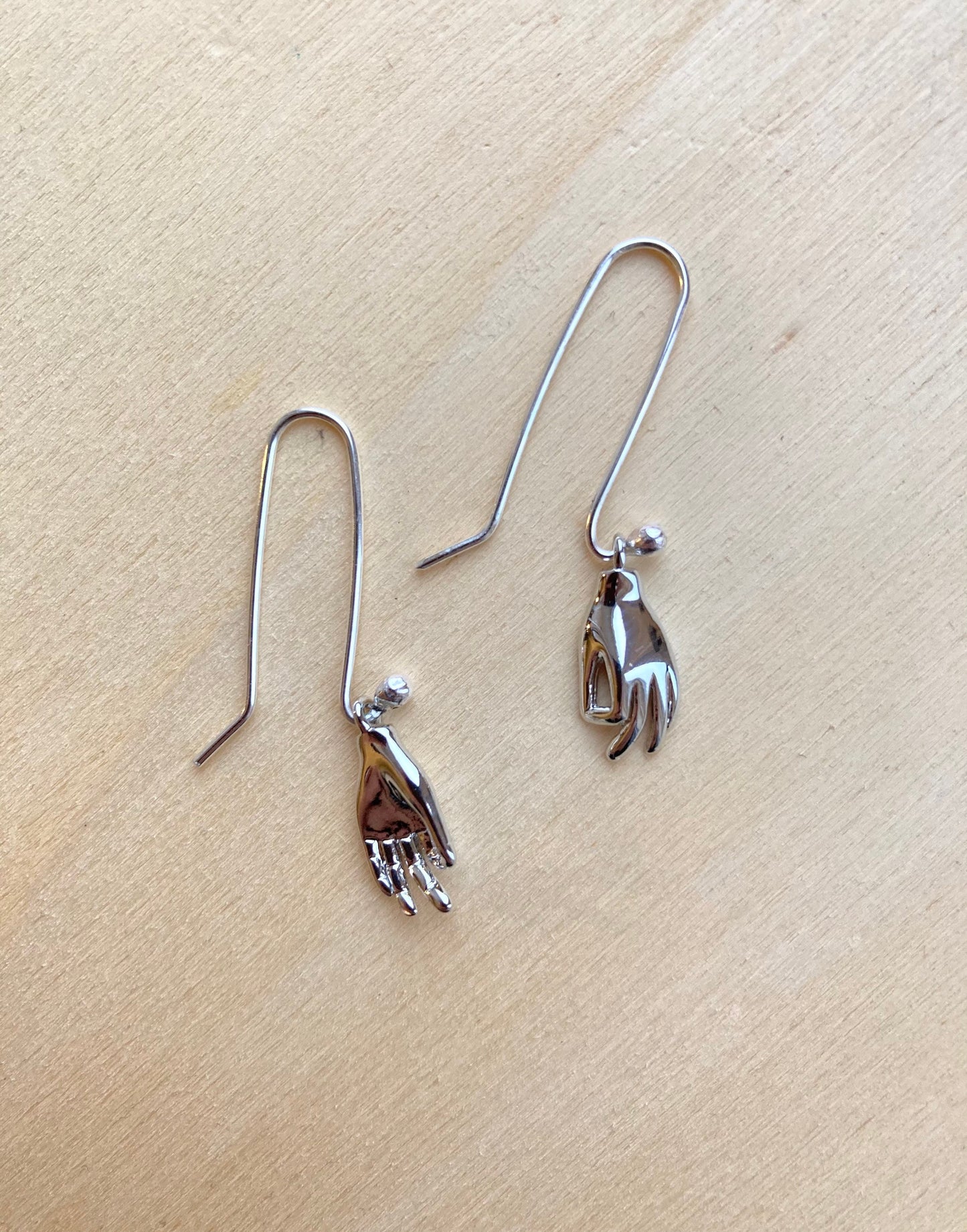 Helping hand earrings