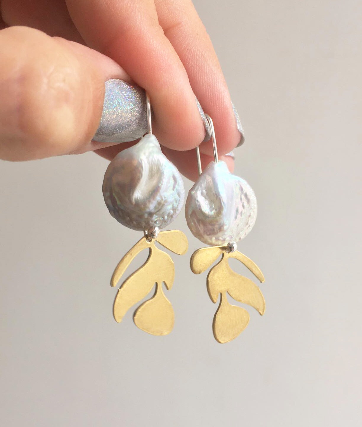 Brass leaf earrings, with pearl and silver hooks